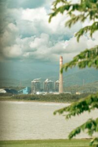 A power plant behind a sea